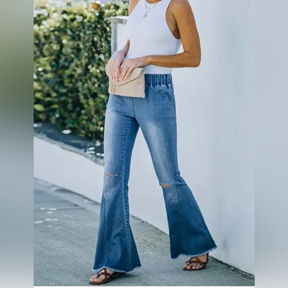 Denim - High waisted Distressed flare jeans